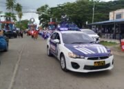 Meski Cuaca Hujan, Polres Raja Ampat Tetap Berikan Pengamanan dan Pengawalan Maksimal Giat Karnaval Budaya